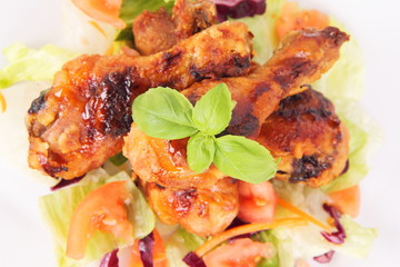Fried chicken legs with side salad