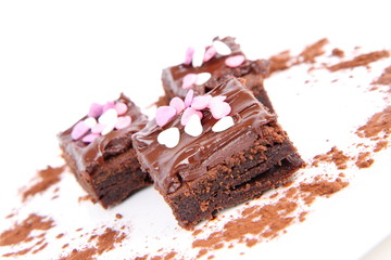 Brownie with chocolate and sugar hearts decoration