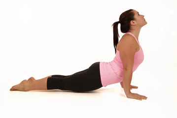 woman doing yoga pose upward facing dog Urdhva Mukha Svanasana