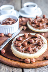 Bun slices with chocolate cream and nuts