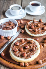 Bun slices with chocolate cream and nuts