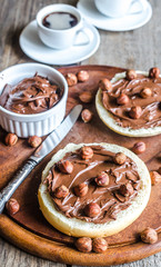 Bun slices with chocolate cream and nuts