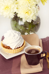 Coffee and cake with whipped cream