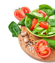 Fresh vegetable salad isolated on white