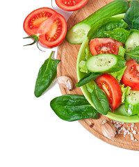 Fresh vegetable salad isolated on white