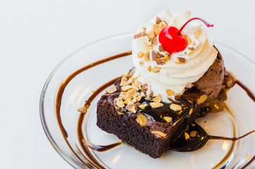 Chocolate brownie icecream and cherry