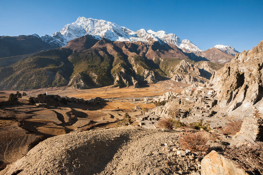The old village and  Annapurna mountain range, Nepal.