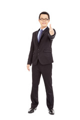 Confident businessman standing arms thumb up
