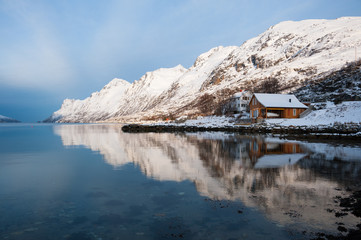 Reflection of the mountain at Ersfjordbotn, Norway.