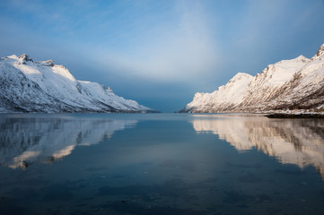 Fototapeta na wymiar Morning reflection of the mountain at Ersfjordbotn, Norway.