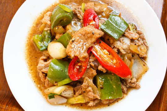 Fried pork with sweet peppers.