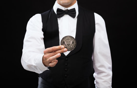 Dealer Holding Half Dollar Coin