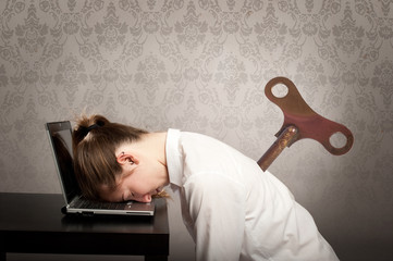 businesswoman sleeping on laptop