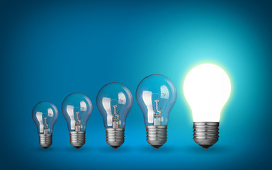 Row of light bulbs.Idea concept on blue background.
