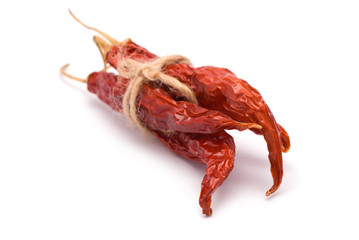 Bundle of Dried Chili Peppers isolated on white