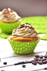 Tasty cupcakes with butter cream