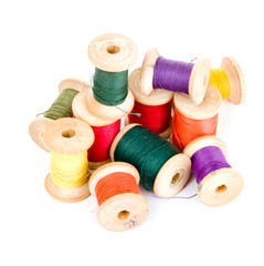 Spools of thread isolated on white background