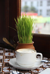 cup of aromatic coffee in a cafe
