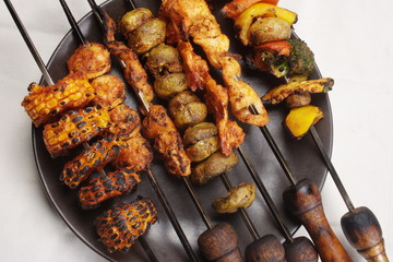 Barbecue Kebab Platter are small pieces of meat on skewers