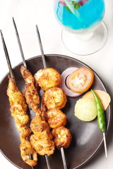 Barbecue Kebab Platter are small pieces of meat on skewers
