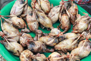 Boiled quail for sale at the market.