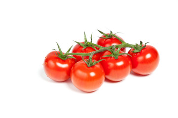 Cherry tomatoes on a branch