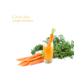 Glass of Carrot Juice with fresh Ingredients