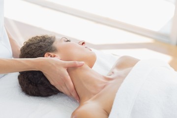 Obraz na płótnie Canvas Woman receiving neck massage