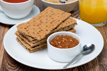 delicious breakfast - crisp bread with orange jam
