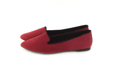 Two beautiful crimson female shoes without heels side view