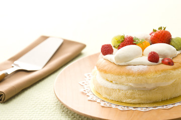 Cheese souffle, fruits cake, and cake server
