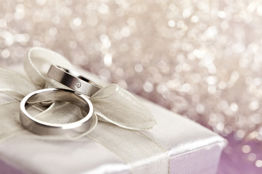 Wedding rings on silver giftbox