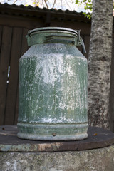 Old metal milk can