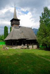 Fototapeta na wymiar Monastery Dragoslavele. Traditional wood church from Romania.