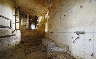old abandoned room with sink and faucet