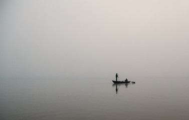 lone fisherman in the river