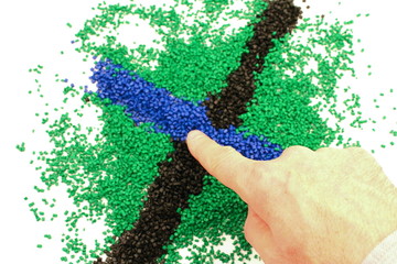 Dito della mano indica croce colorata