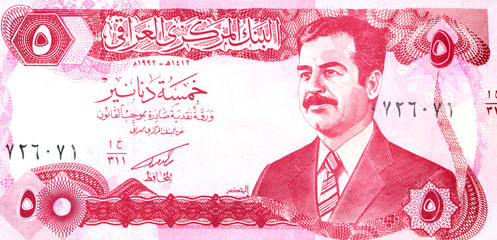 Saddam Hussein on a 5 dinar banknote