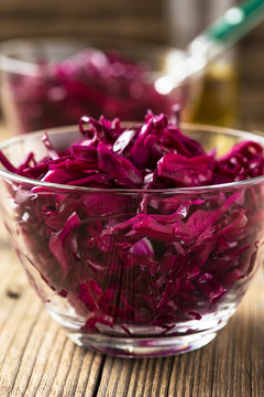 Red coleslaw on wooden background