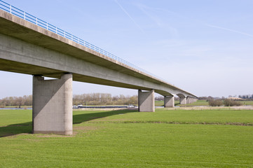 Pillars of highway bridge over river