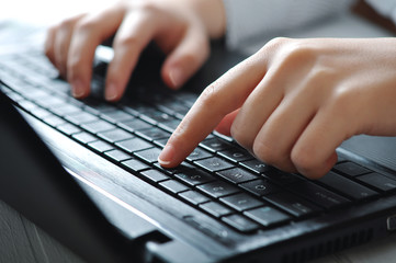 Typing female hands