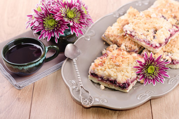 Coffee cup and blackberry pie