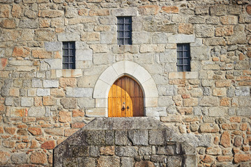 Ancient castle door at the Palace of the Dukes of Braganza, Guim