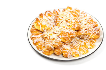 Bear claw pastry with sliced almonds and sugar