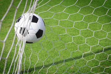 soccer ball in goal