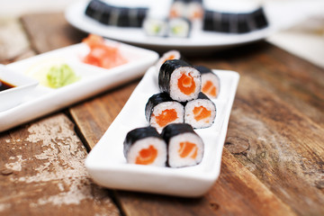 Salmon sushi set on a wooden table