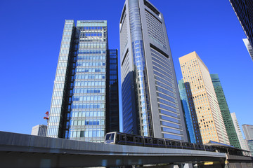 Fototapeta na wymiar Monorail and Skyscrapers in Shiodome