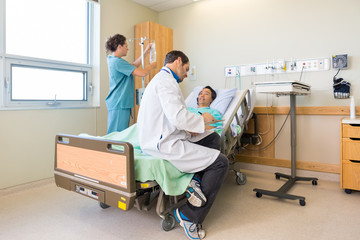 Medical Team And Patient In Hospital