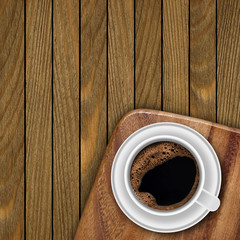 Cup of coffee on wooden background