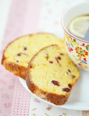 orange cake with cup of tea